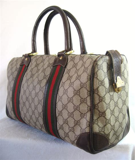 this is not a gucci bag duffle|Gucci duffle bag vintage.